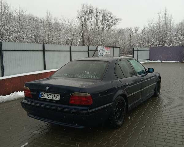 Синий БМВ 7 Серия, объемом двигателя 3.5 л и пробегом 415 тыс. км за 4950 $, фото 3 на Automoto.ua