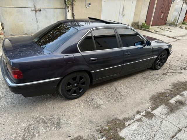 Синий БМВ 7 Серия, объемом двигателя 2.5 л и пробегом 480 тыс. км за 3700 $, фото 6 на Automoto.ua