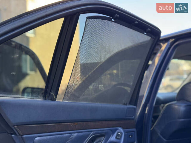 Синий БМВ 7 Серия, объемом двигателя 3.5 л и пробегом 394 тыс. км за 5299 $, фото 20 на Automoto.ua