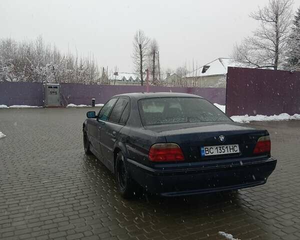 Синий БМВ 7 Серия, объемом двигателя 3.5 л и пробегом 415 тыс. км за 4950 $, фото 4 на Automoto.ua