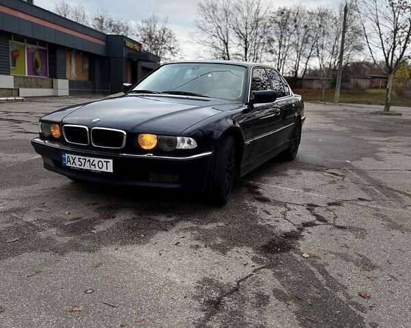 Синий БМВ 7 Серия, объемом двигателя 4.4 л и пробегом 470 тыс. км за 4600 $, фото 3 на Automoto.ua