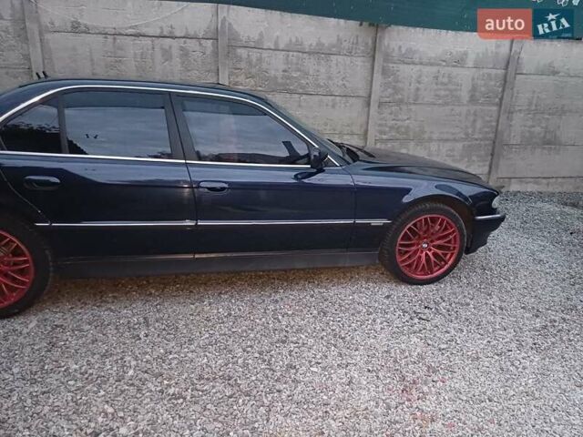 Синий БМВ 7 Серия, объемом двигателя 4.4 л и пробегом 460 тыс. км за 5500 $, фото 1 на Automoto.ua