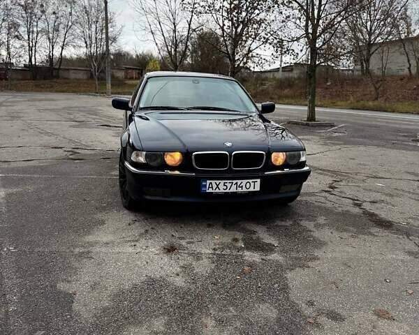 Синий БМВ 7 Серия, объемом двигателя 4.4 л и пробегом 470 тыс. км за 4600 $, фото 2 на Automoto.ua