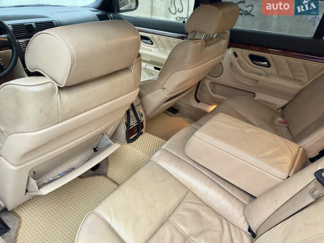 Синий БМВ 7 Серия, объемом двигателя 3 л и пробегом 353 тыс. км за 4350 $, фото 11 на Automoto.ua