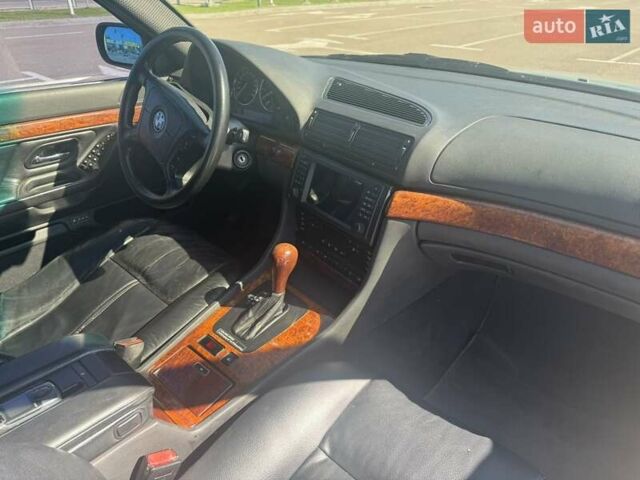 Синий БМВ 7 Серия, объемом двигателя 3 л и пробегом 395 тыс. км за 6800 $, фото 9 на Automoto.ua