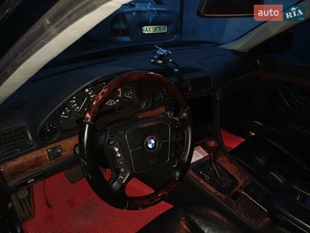 Синий БМВ 7 Серия, объемом двигателя 4.4 л и пробегом 460 тыс. км за 5500 $, фото 5 на Automoto.ua