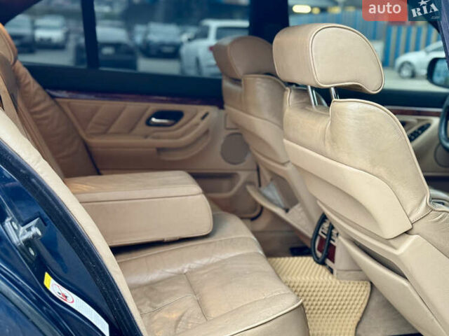 Синий БМВ 7 Серия, объемом двигателя 3 л и пробегом 353 тыс. км за 4350 $, фото 14 на Automoto.ua