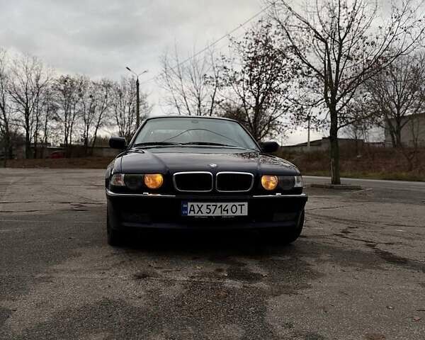 Синий БМВ 7 Серия, объемом двигателя 4.4 л и пробегом 470 тыс. км за 4600 $, фото 1 на Automoto.ua