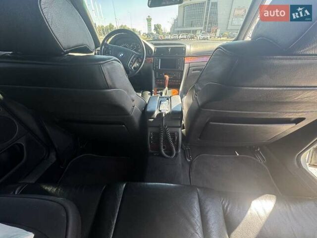 Синий БМВ 7 Серия, объемом двигателя 3 л и пробегом 395 тыс. км за 6800 $, фото 4 на Automoto.ua