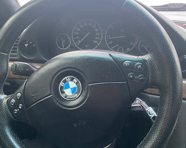 Синій БМВ 7 Серія, об'ємом двигуна 3 л та пробігом 192 тис. км за 8888 $, фото 41 на Automoto.ua