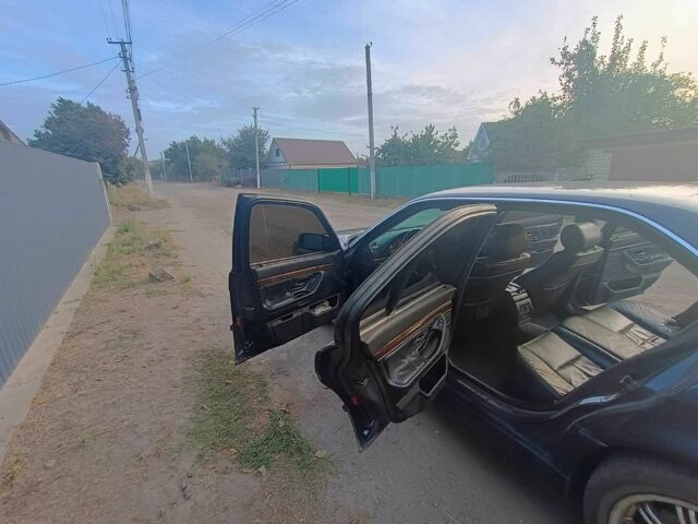 Синий БМВ 7 Серия, объемом двигателя 3 л и пробегом 350 тыс. км за 7600 $, фото 9 на Automoto.ua
