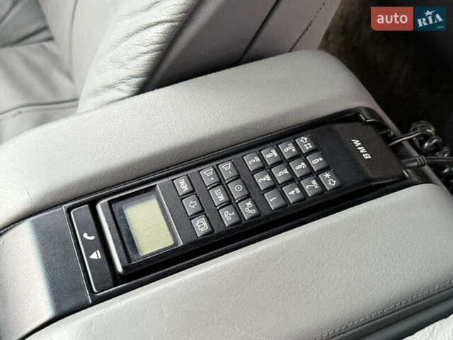 Синій БМВ 7 Серія, об'ємом двигуна 3.5 л та пробігом 340 тис. км за 5700 $, фото 78 на Automoto.ua