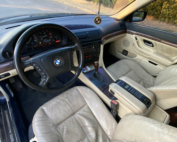 Синий БМВ 7 Серия, объемом двигателя 3 л и пробегом 346 тыс. км за 4800 $, фото 8 на Automoto.ua