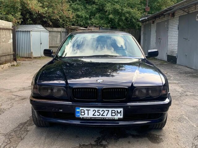 Синий БМВ 7 Серия, объемом двигателя 3 л и пробегом 376 тыс. км за 4000 $, фото 1 на Automoto.ua