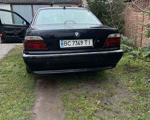 Синій БМВ 7 Серія, об'ємом двигуна 3 л та пробігом 563 тис. км за 8000 $, фото 1 на Automoto.ua