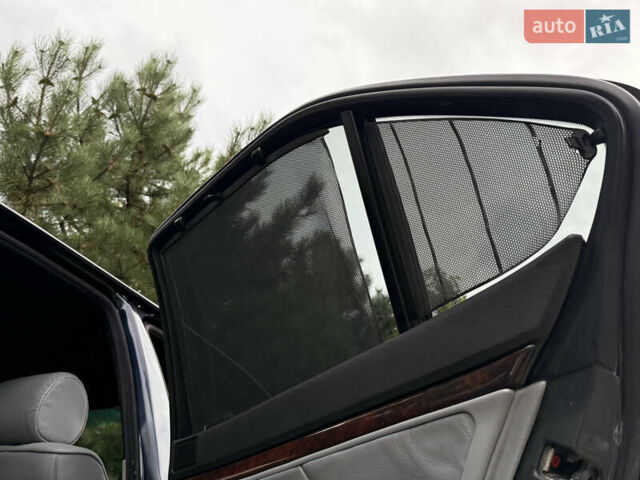 Синій БМВ 7 Серія, об'ємом двигуна 3.5 л та пробігом 340 тис. км за 5700 $, фото 76 на Automoto.ua