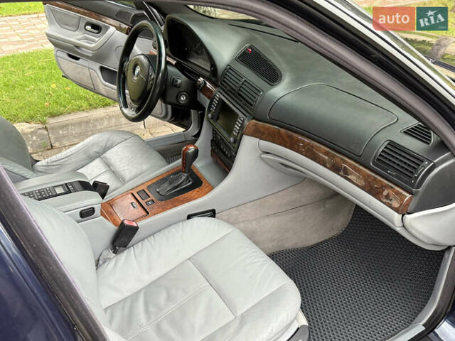 Синій БМВ 7 Серія, об'ємом двигуна 3.5 л та пробігом 340 тис. км за 5700 $, фото 70 на Automoto.ua