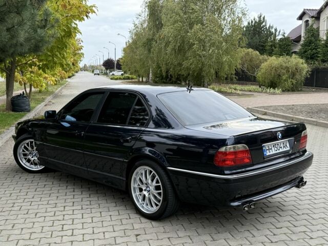 Синий БМВ 7 Серия, объемом двигателя 3.5 л и пробегом 340 тыс. км за 5700 $, фото 3 на Automoto.ua