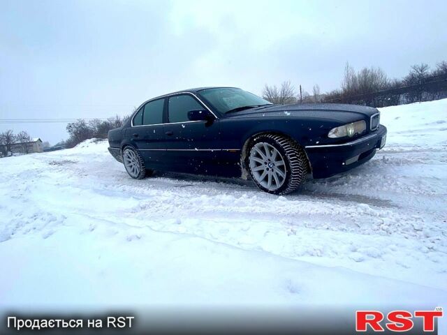 Синий БМВ 7 Серия, объемом двигателя 3.5 л и пробегом 340 тыс. км за 6900 $, фото 1 на Automoto.ua
