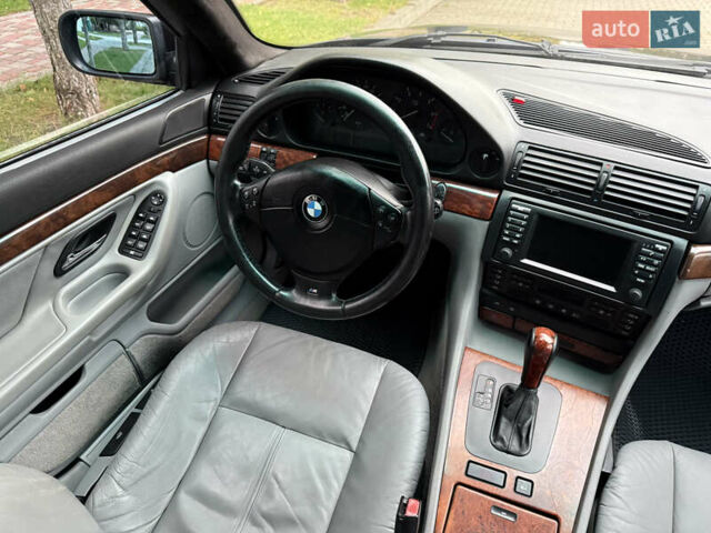 Синій БМВ 7 Серія, об'ємом двигуна 3.5 л та пробігом 340 тис. км за 5700 $, фото 85 на Automoto.ua