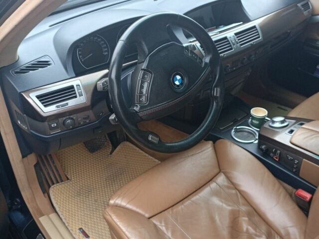 Синий БМВ 7 Серия, объемом двигателя 4.4 л и пробегом 467 тыс. км за 8000 $, фото 1 на Automoto.ua