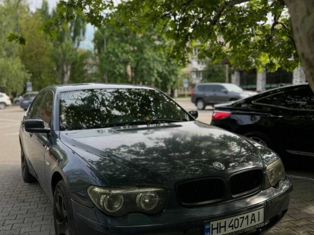 Синій БМВ 7 Серія, об'ємом двигуна 4.4 л та пробігом 270 тис. км за 6000 $, фото 1 на Automoto.ua