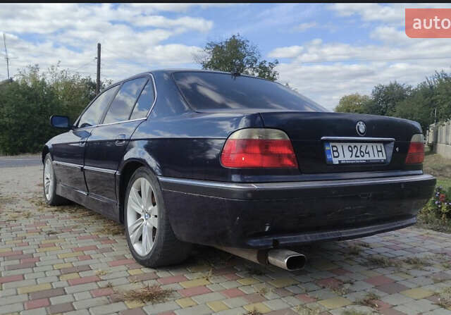 Синий БМВ 7 Серия, объемом двигателя 2.5 л и пробегом 300 тыс. км за 2500 $, фото 3 на Automoto.ua