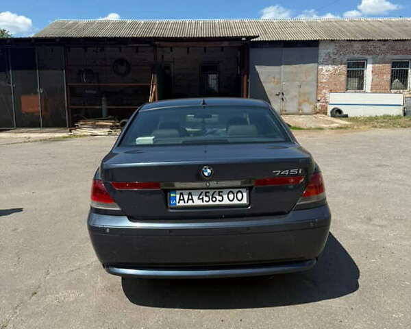 Синій БМВ 7 Серія, об'ємом двигуна 4.4 л та пробігом 333 тис. км за 3700 $, фото 1 на Automoto.ua