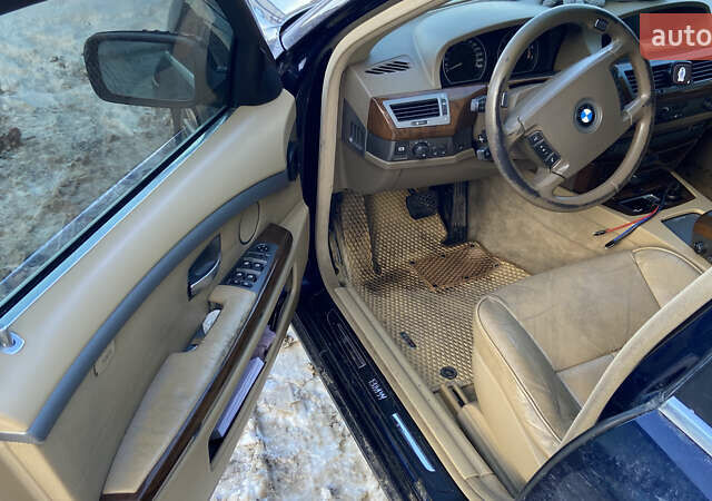 Синий БМВ 7 Серия, объемом двигателя 3 л и пробегом 385 тыс. км за 5900 $, фото 8 на Automoto.ua