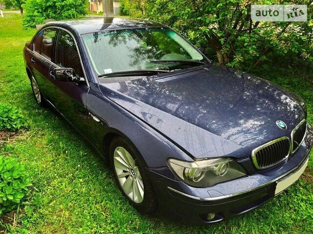 Синий БМВ 7 Серия, объемом двигателя 6 л и пробегом 245 тыс. км за 4500 $, фото 1 на Automoto.ua