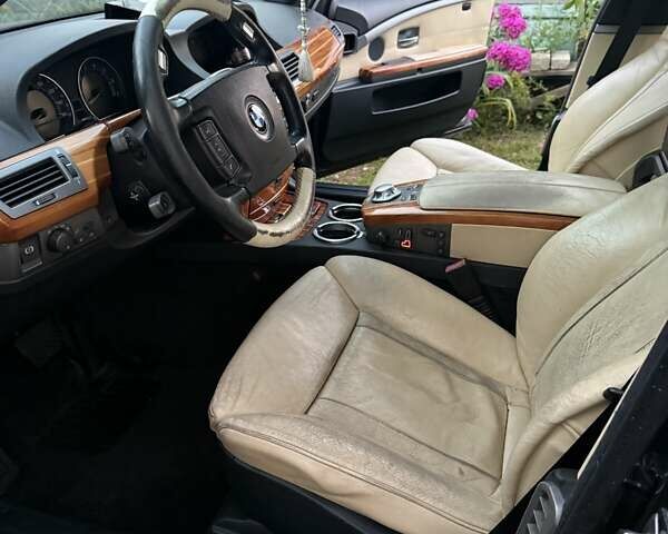 Синий БМВ 7 Серия, объемом двигателя 4.4 л и пробегом 289 тыс. км за 6000 $, фото 2 на Automoto.ua