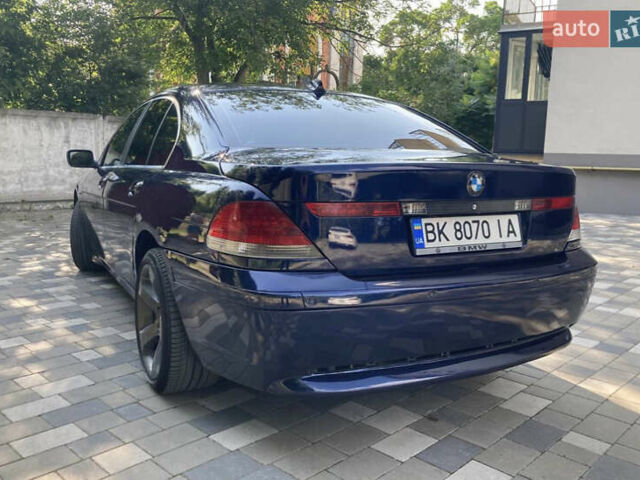 Синий БМВ 7 Серия, объемом двигателя 2.99 л и пробегом 585 тыс. км за 5800 $, фото 2 на Automoto.ua