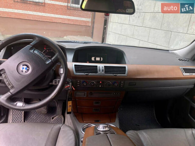 Синий БМВ 7 Серия, объемом двигателя 2.99 л и пробегом 585 тыс. км за 5800 $, фото 6 на Automoto.ua