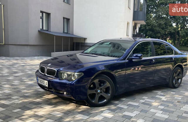 Синий БМВ 7 Серия, объемом двигателя 2.99 л и пробегом 585 тыс. км за 5800 $, фото 1 на Automoto.ua