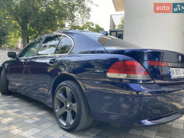 Синий БМВ 7 Серия, объемом двигателя 2.99 л и пробегом 585 тыс. км за 5800 $, фото 3 на Automoto.ua