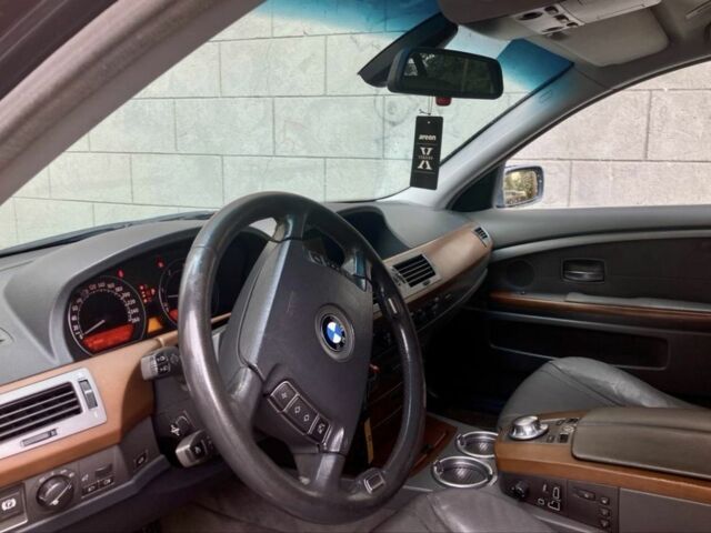 Синій БМВ 7 Серія, об'ємом двигуна 3 л та пробігом 300 тис. км за 6200 $, фото 3 на Automoto.ua