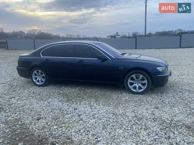 Синий БМВ 7 Серия, объемом двигателя 4 л и пробегом 253 тыс. км за 6700 $, фото 2 на Automoto.ua