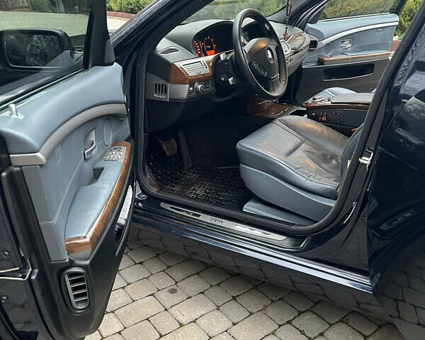 Синий БМВ 7 Серия, объемом двигателя 4.4 л и пробегом 260 тыс. км за 10500 $, фото 11 на Automoto.ua