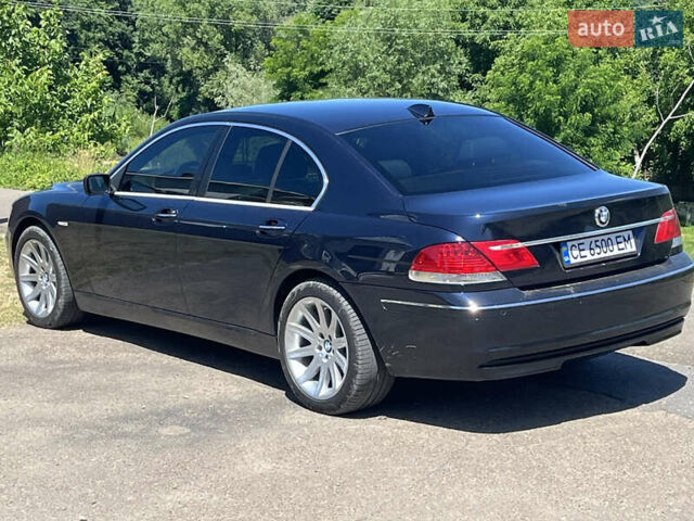 Синий БМВ 7 Серия, объемом двигателя 4.4 л и пробегом 260 тыс. км за 10500 $, фото 1 на Automoto.ua