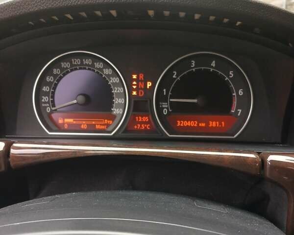 Синий БМВ 7 Серия, объемом двигателя 4 л и пробегом 306 тыс. км за 12000 $, фото 1 на Automoto.ua