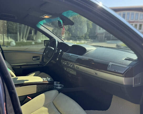 Синий БМВ 7 Серия, объемом двигателя 3.98 л и пробегом 270 тыс. км за 7500 $, фото 13 на Automoto.ua