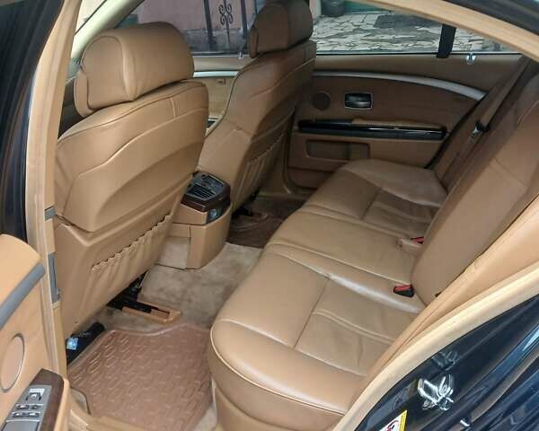 Синий БМВ 7 Серия, объемом двигателя 4 л и пробегом 306 тыс. км за 12000 $, фото 2 на Automoto.ua