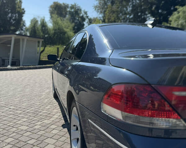 Синий БМВ 7 Серия, объемом двигателя 3.98 л и пробегом 270 тыс. км за 7500 $, фото 7 на Automoto.ua