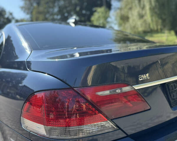 Синий БМВ 7 Серия, объемом двигателя 3.98 л и пробегом 270 тыс. км за 7500 $, фото 9 на Automoto.ua