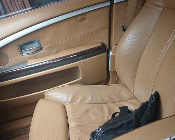 Синий БМВ 7 Серия, объемом двигателя 4 л и пробегом 306 тыс. км за 12000 $, фото 4 на Automoto.ua