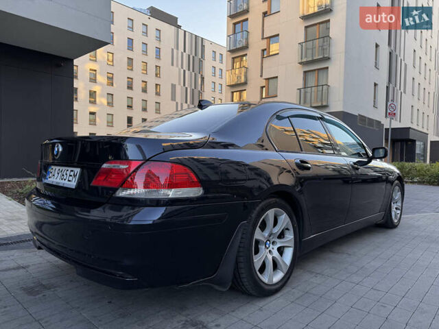 Синий БМВ 7 Серия, объемом двигателя 4.8 л и пробегом 258 тыс. км за 8900 $, фото 7 на Automoto.ua