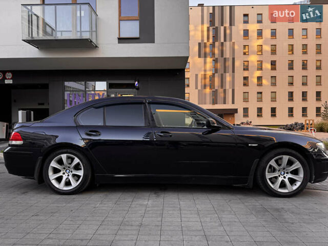 Синий БМВ 7 Серия, объемом двигателя 4.8 л и пробегом 258 тыс. км за 8900 $, фото 8 на Automoto.ua