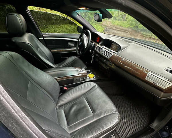 Синий БМВ 7 Серия, объемом двигателя 3 л и пробегом 370 тыс. км за 8600 $, фото 10 на Automoto.ua