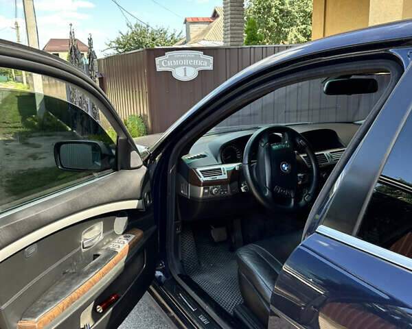 Синий БМВ 7 Серия, объемом двигателя 3 л и пробегом 370 тыс. км за 8600 $, фото 4 на Automoto.ua