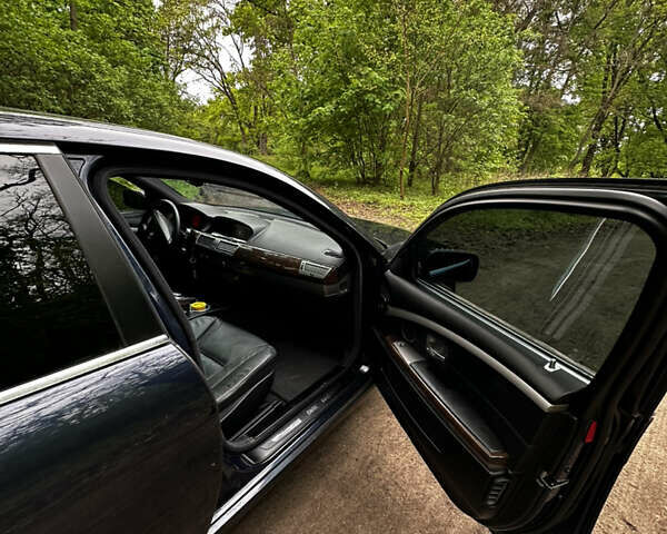 Синий БМВ 7 Серия, объемом двигателя 3 л и пробегом 370 тыс. км за 8600 $, фото 11 на Automoto.ua